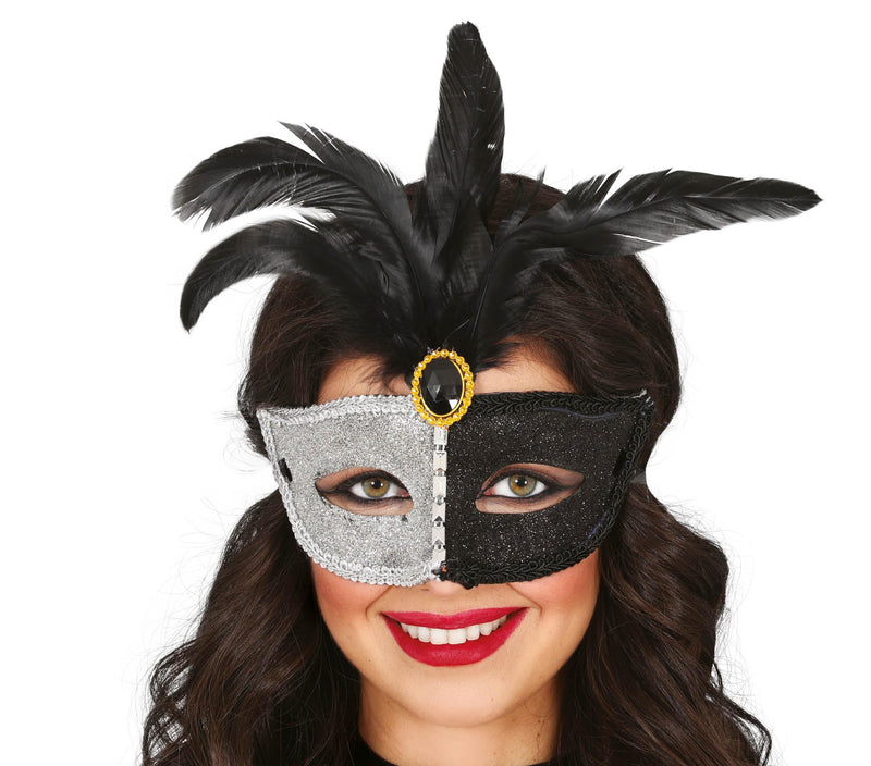 BLACK AND WHITE MASK WITH BLACK FEATHER