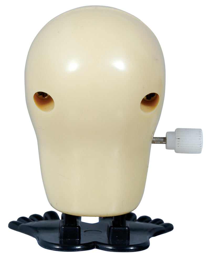 BOX 12 WIND-UP WALKING SKULL, 5 CM