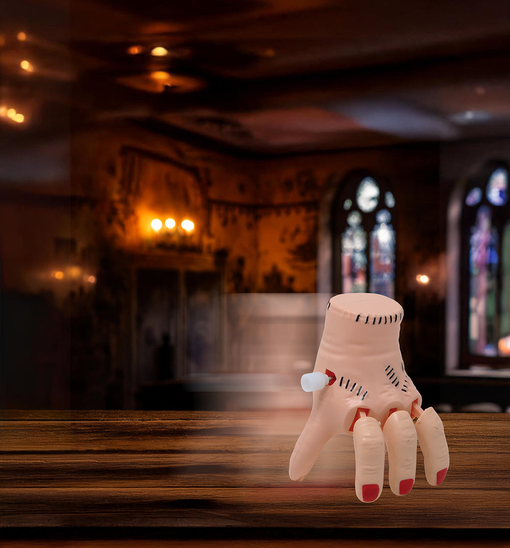 BOX OF 12 WIND-UP WALKING HANDS, 8 CM